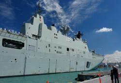 HMAS Canberra approaching the Noumea dock